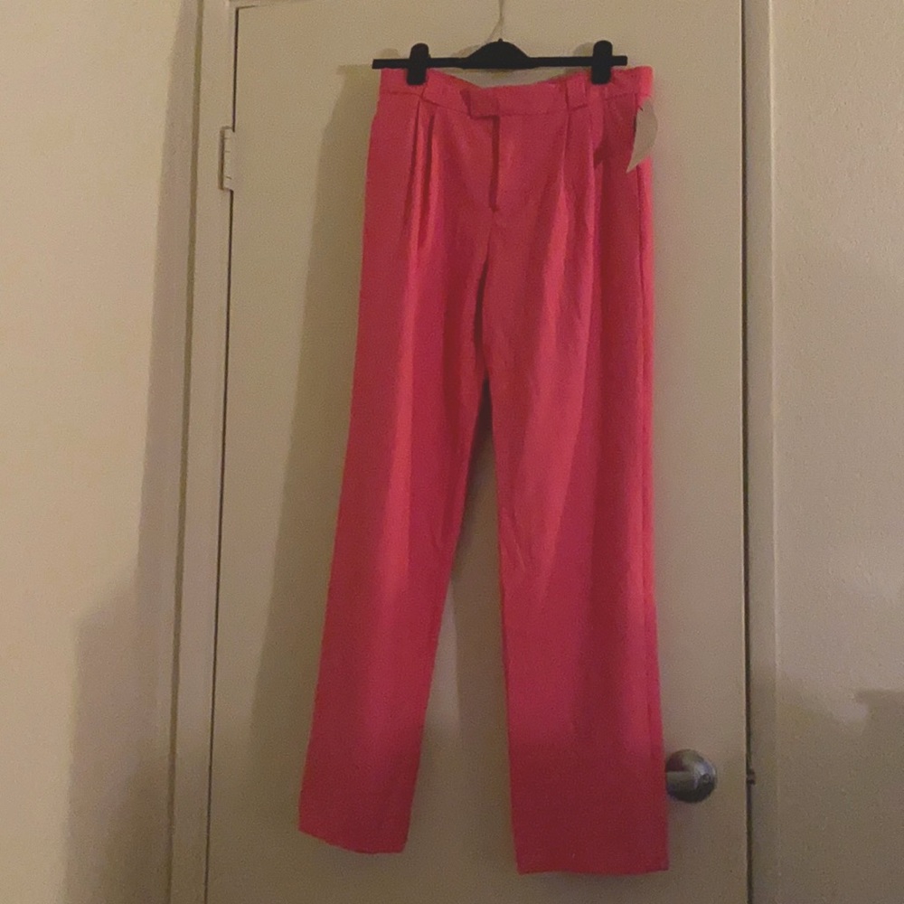Pretty pink tailored trousers by Zara.